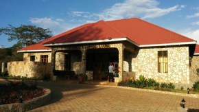 Отель Hhando Coffee Lodge  Karatu